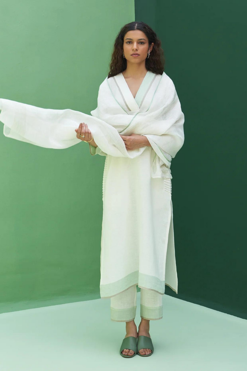 June Border Linen Kurta Set
- Ivory linen by Manan in ivory color for women in Singapore