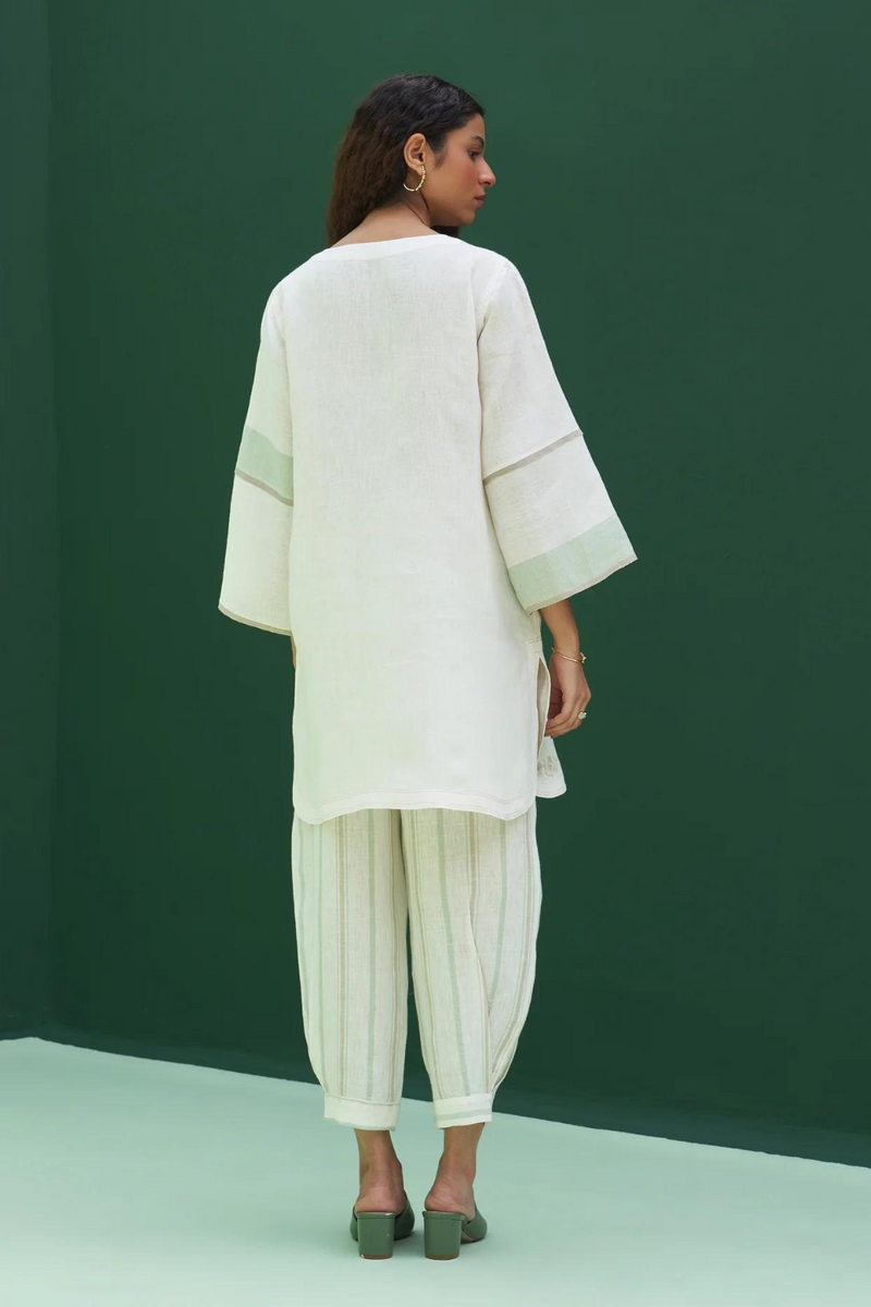 Insha Hand-Embroidered Kurta
- Ivory linen by Manan in ivory color for women in Singapore