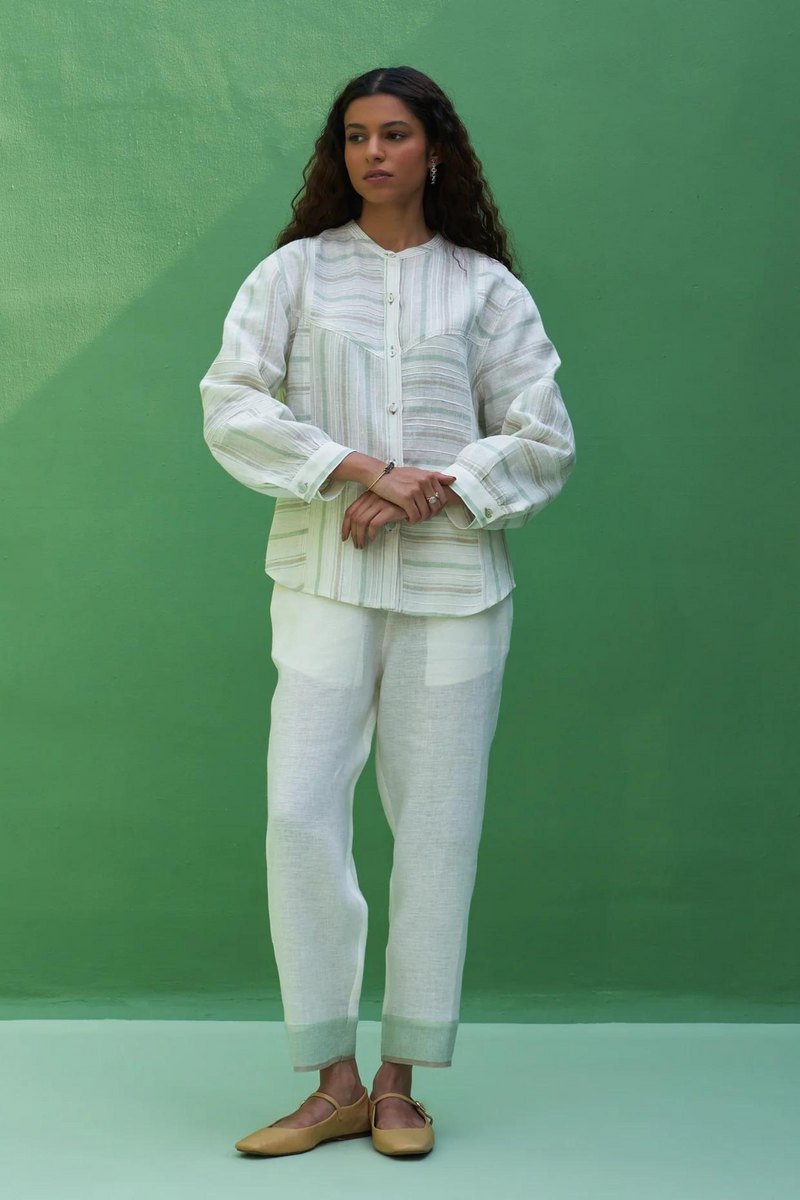 Inawi Border Linen Pant
- Ivory linen by Manan in ivory color for women in Singapore
