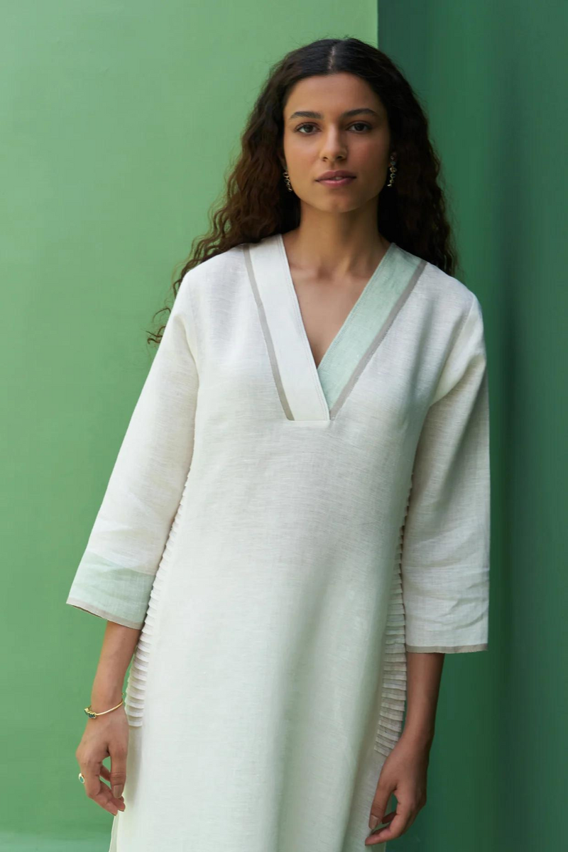 June Border Linen Pleated Kurta
- Ivory linen by Manan in ivory color for women in Singapore