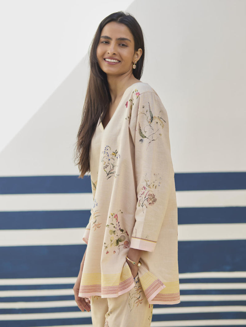 Raha Watercolour Floral Kurta Set
- Sand linen by Manan in natural color for women in Singapore