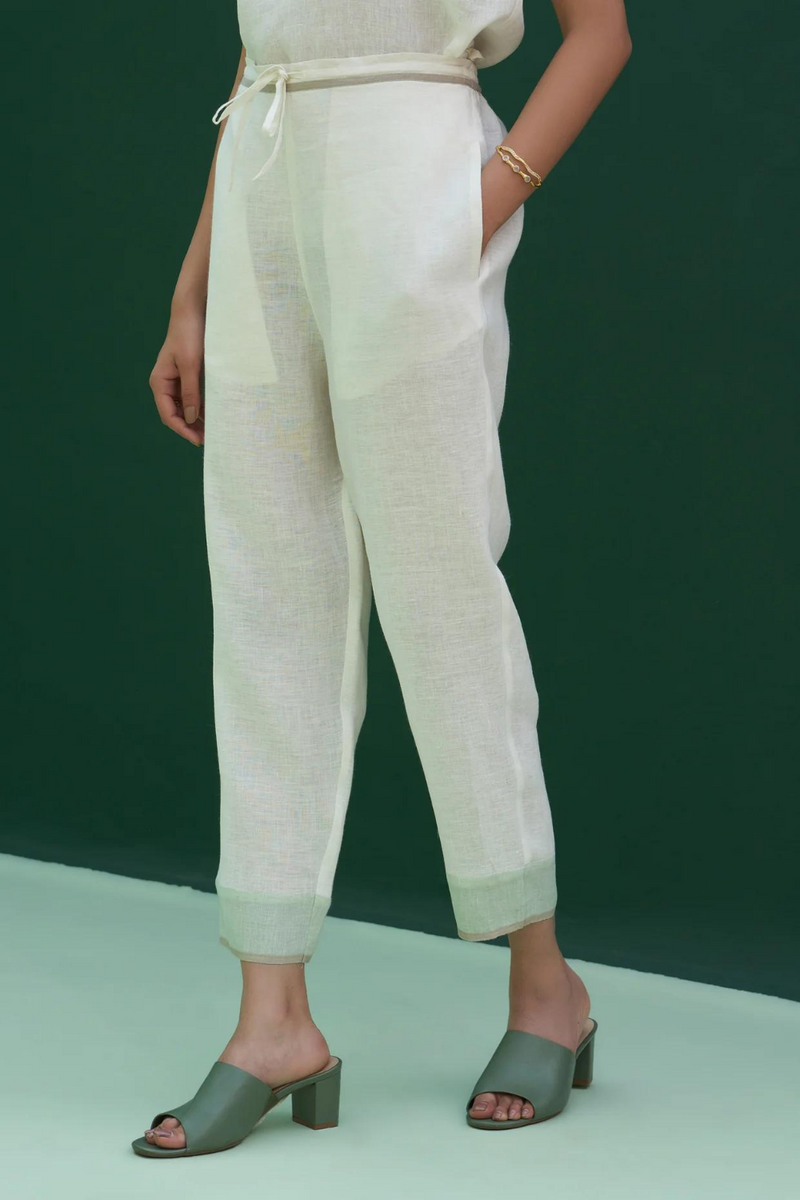 Inawi Border Linen Pant
- Ivory linen by Manan in ivory color for women in Singapore