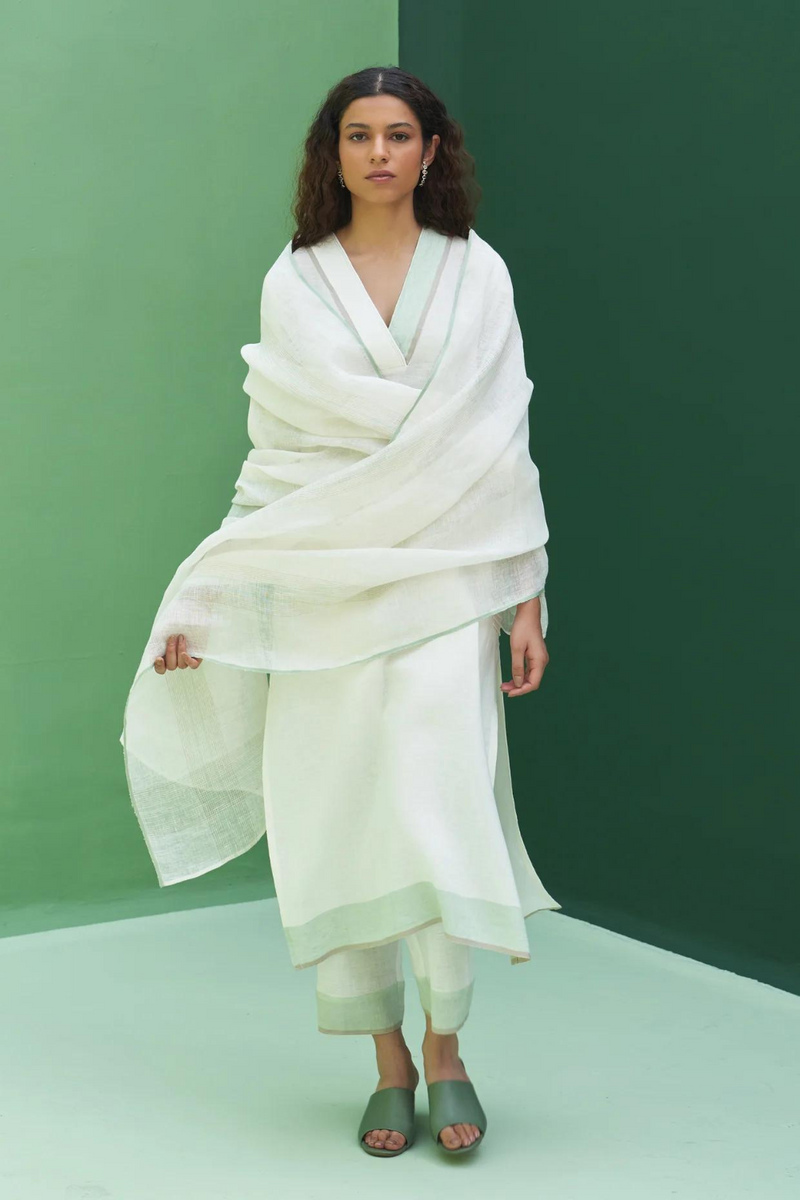 June Border Linen Kurta Set
- Ivory linen by Manan in ivory color for women in Singapore
