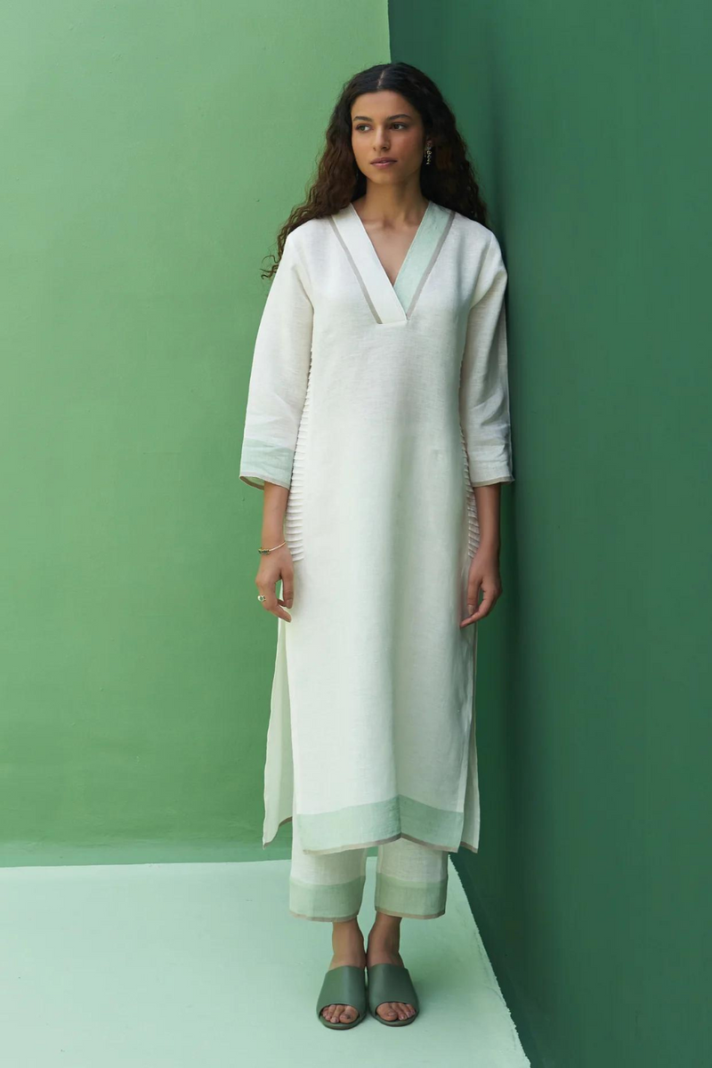 June Border Linen Pleated Kurta
- Ivory linen by Manan in ivory color for women in Singapore