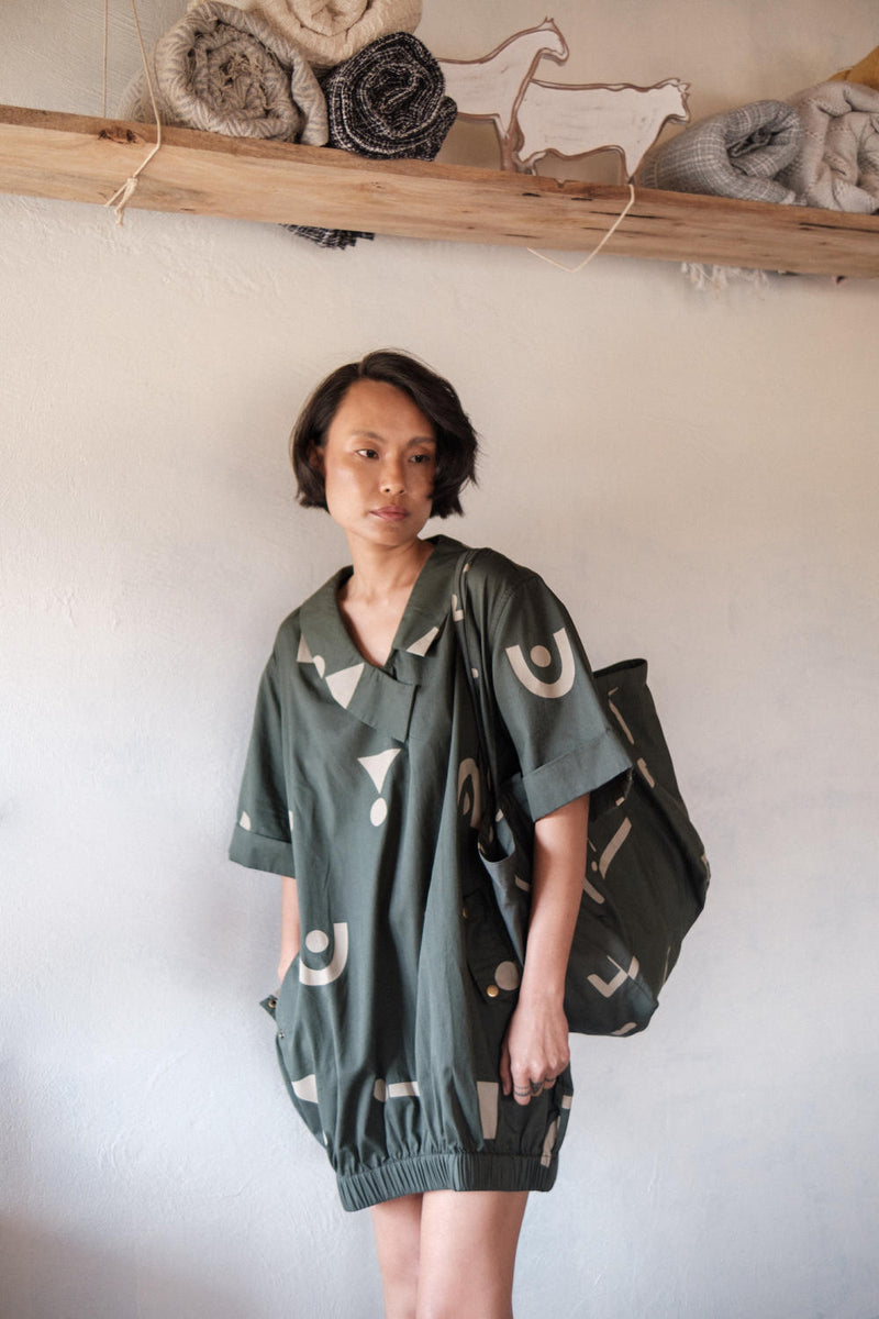 Sydney Shift Dress-Deep Green Triangle Printed cotton by The Terra Tribe in green color for women in Singapore