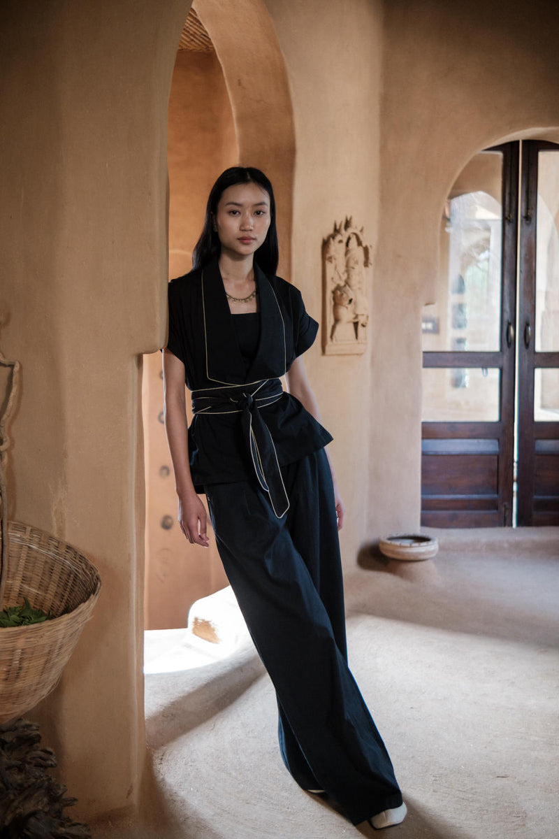 Friday Flared Pants-Black cotton by The Terra Tribe in black color for women in Singapore