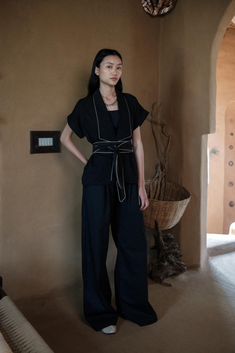 Friday Flared Pants-Black cotton by The Terra Tribe in black color for women in Singapore