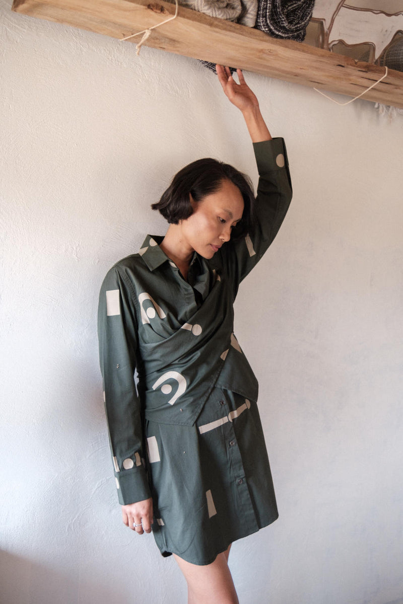Seattle Wrap Shirt Dress-Deep Green Triangle Printed cotton by The Terra Tribe in green color for women in Singapore