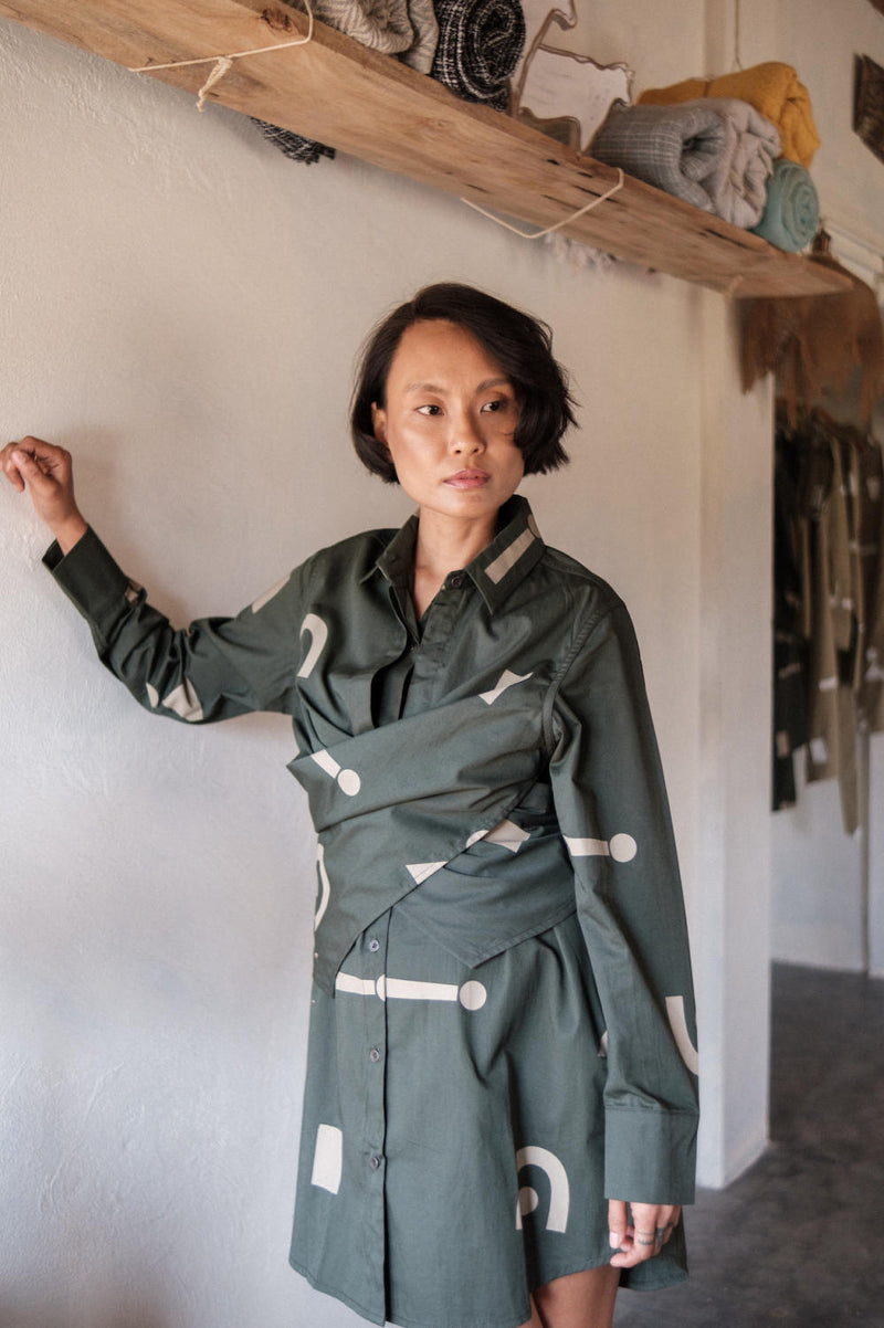 Seattle Wrap Shirt Dress-Deep Green Triangle Printed cotton by The Terra Tribe in green color for women in Singapore