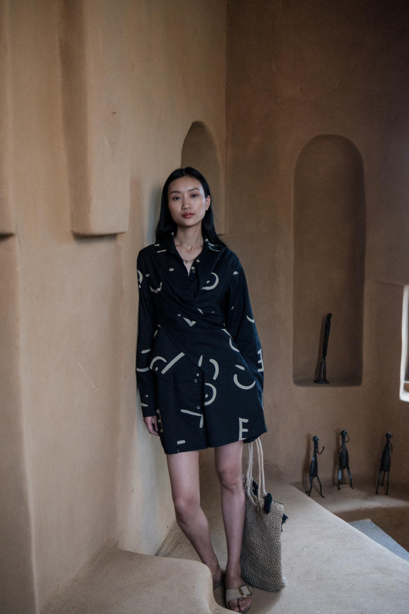 Seattle Wrap Shirt Dress-Black triangle printed cotton by The Terra Tribe in black color for women in Singapore