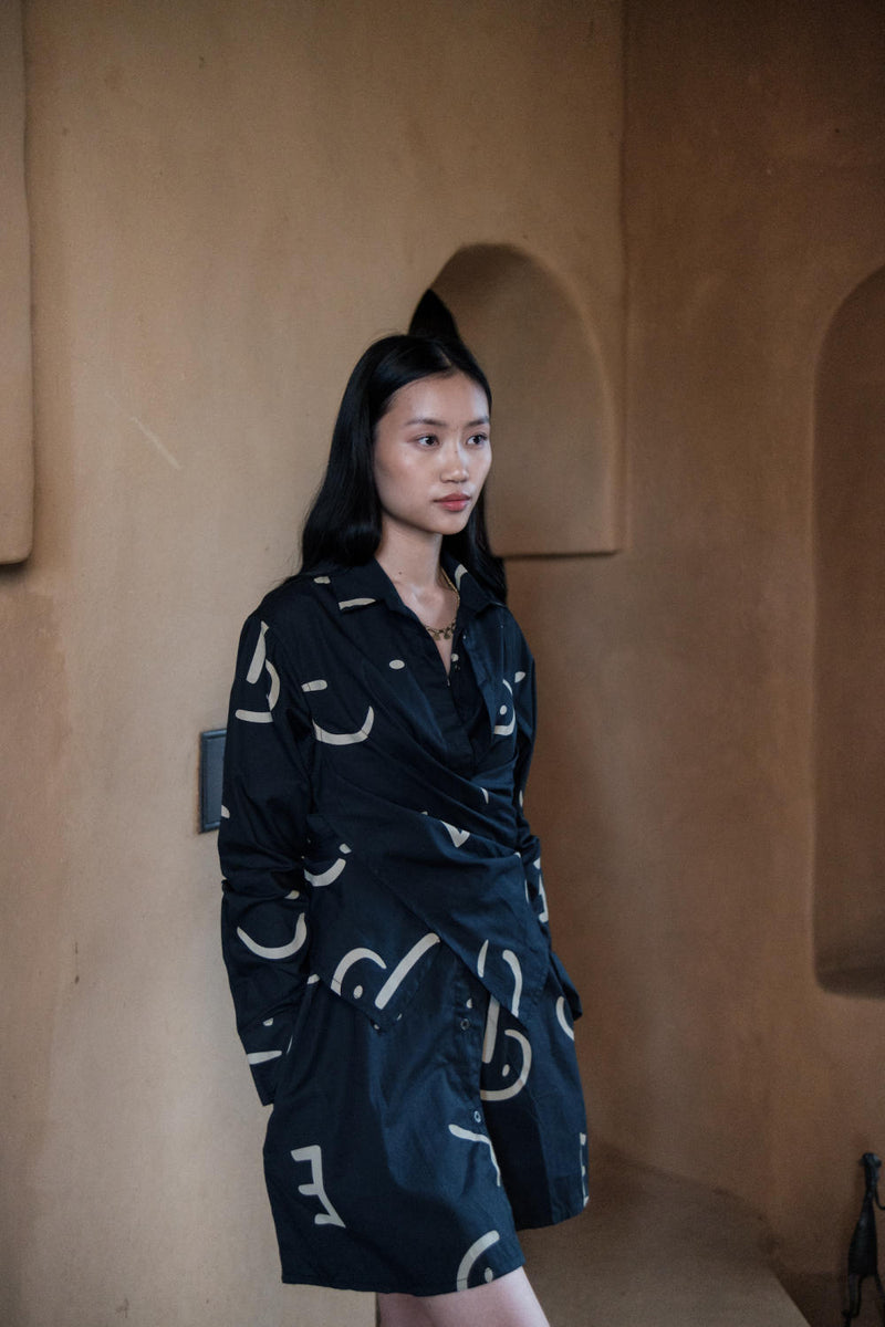 Seattle Wrap Shirt Dress-Black triangle printed cotton by The Terra Tribe in black color for women in Singapore