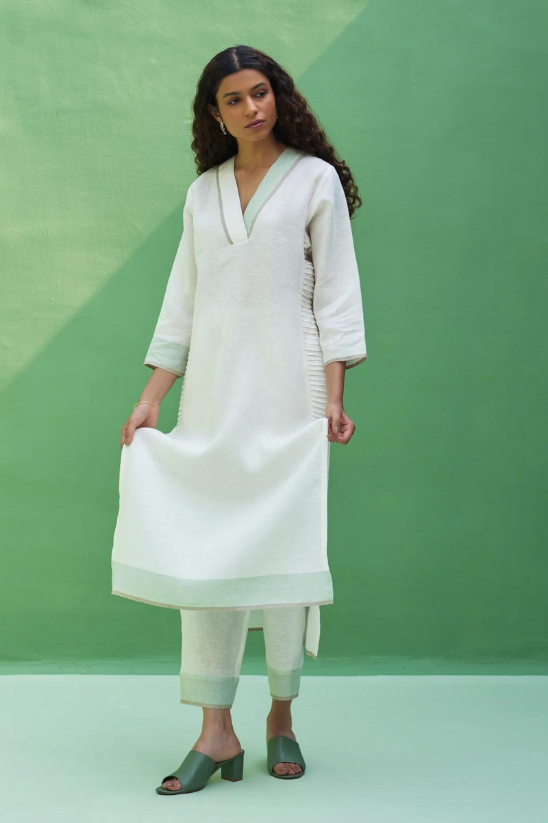 June Border Linen Kurta Set
- Ivory linen by Manan in ivory color for women in Singapore