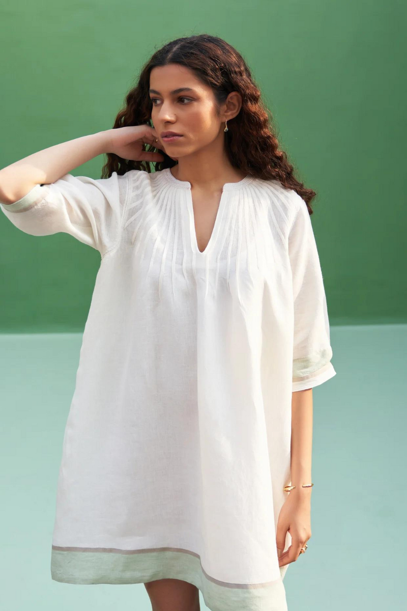 Yima Border Linen Dress
- Ivory linen by Manan in ivory color for women in Singapore