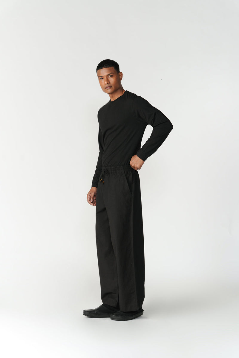 Ease Trousers pant/trouser by Turn Black in black for men in Singapore