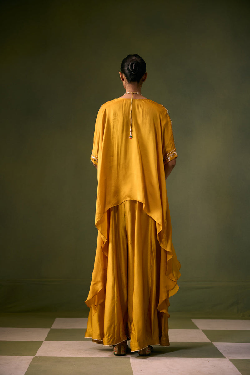 Cove Antifit Asymmetric Top with Flared Pants vegan satin, organza satin indo-western by PRAHNAAYA in musturd yellow for women in Singapore