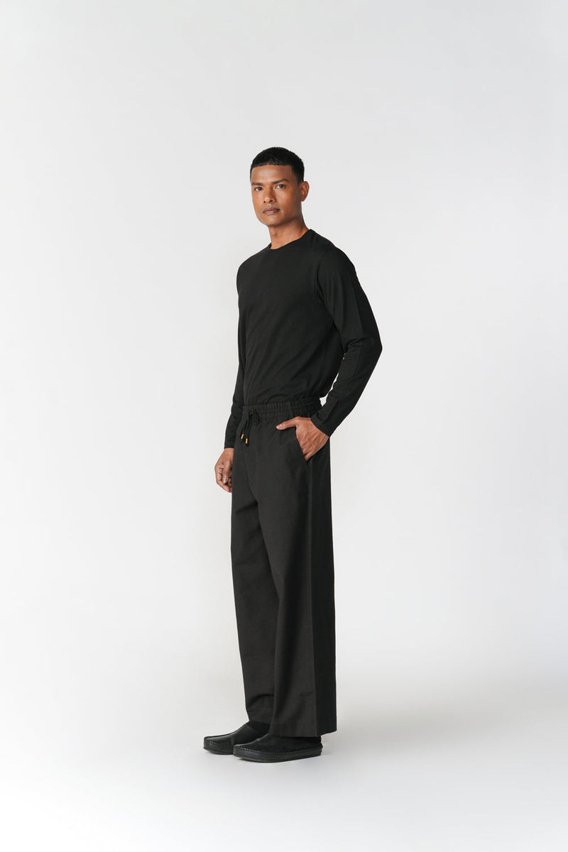 Ease Trousers pant/trouser by Turn Black in black for men in Singapore