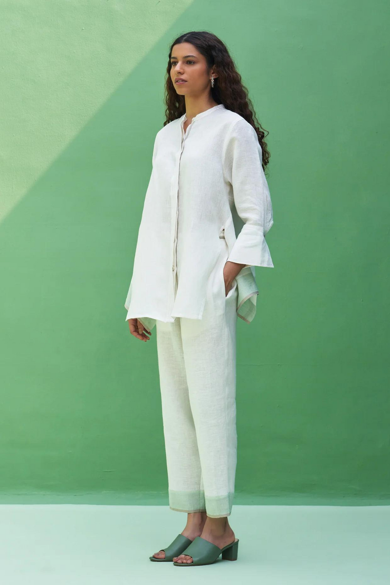 Inawi Border Linen Pant
- Ivory linen by Manan in ivory color for women in Singapore
