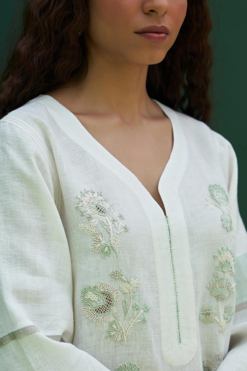 Insha Hand-Embroidered Kurta
- Ivory linen by Manan in ivory color for women in Singapore