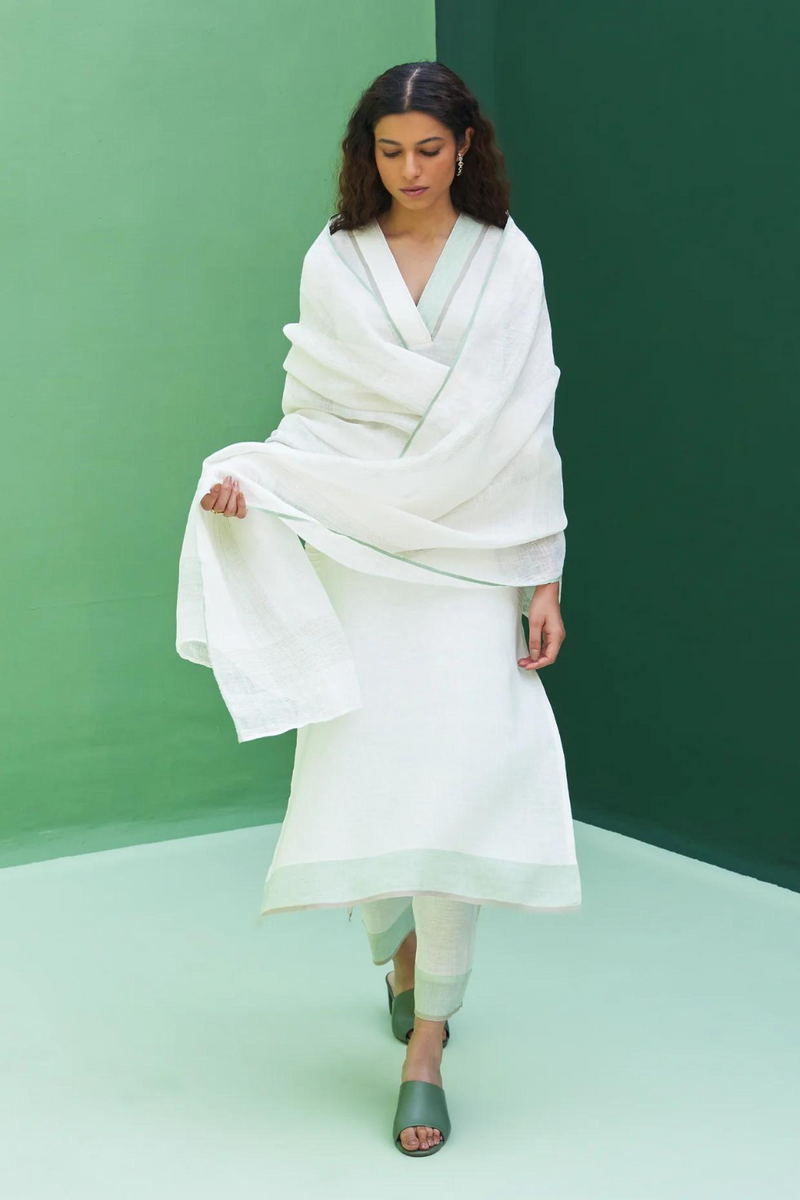 June Border Linen Kurta Set
- Ivory linen by Manan in ivory color for women in Singapore