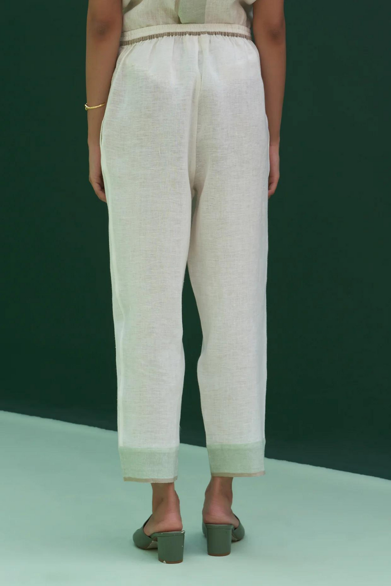 Inawi Border Linen Pant
- Ivory linen by Manan in ivory color for women in Singapore