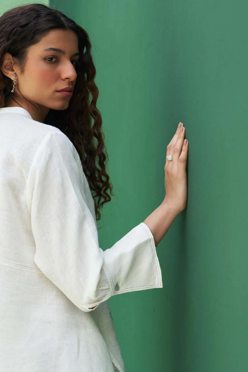 Noi Hand-Embroidered Linen Top
- Ivory linen by Manan in ivory color for women in Singapore