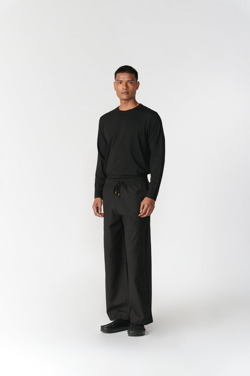 Ease Trousers pant/trouser by Turn Black in black for men in Singapore