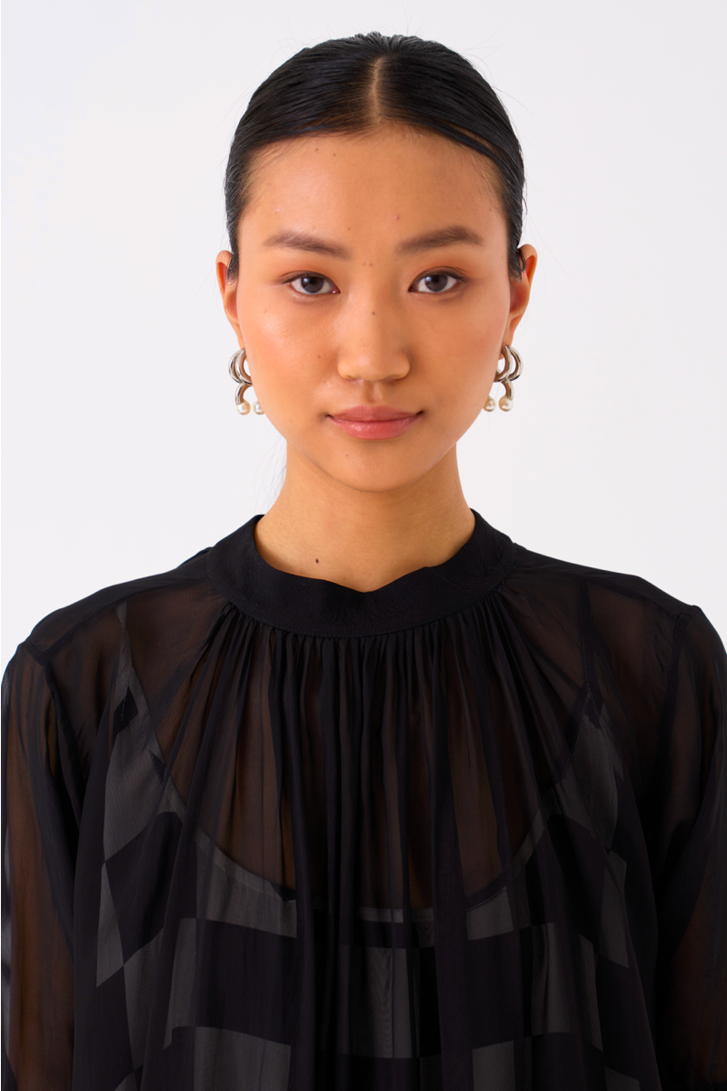 SHEER BOTTOM FRILL DRESS
-BLACK organza by THREE in black color for women in Singapore