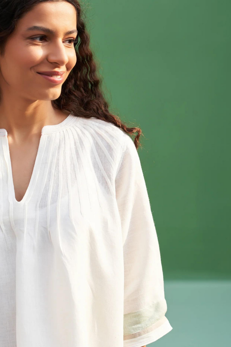 Yima Border Linen Dress
- Ivory linen by Manan in ivory color for women in Singapore
