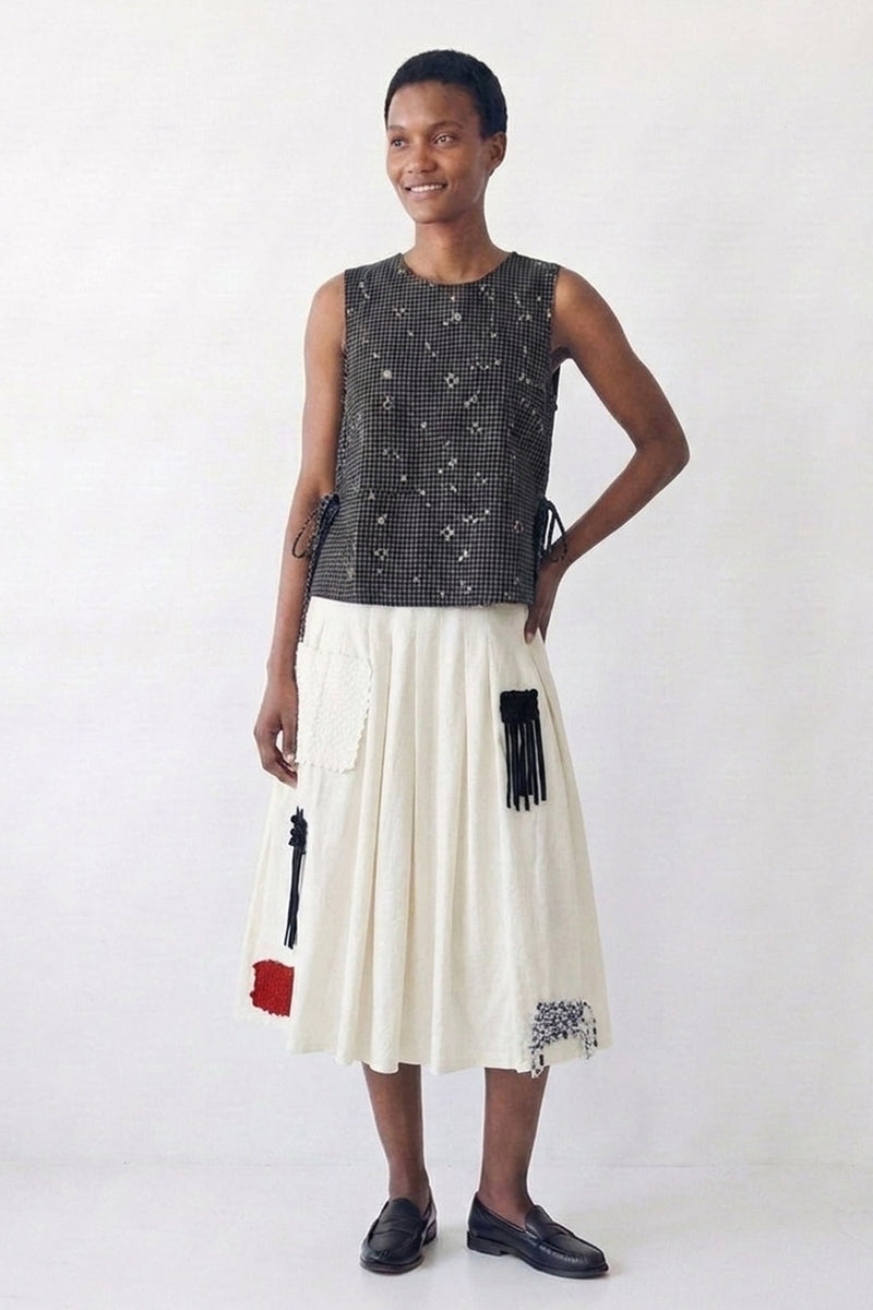 The Pleated Artisan Skirt-Basket Patchwork cotton muslin skirt by World of Crow in white for women in Singapore