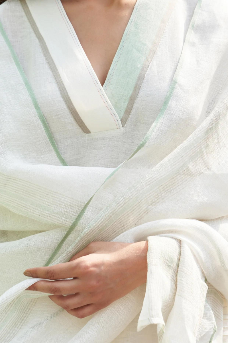 June Border Linen Kurta Set
- Ivory linen by Manan in ivory color for women in Singapore