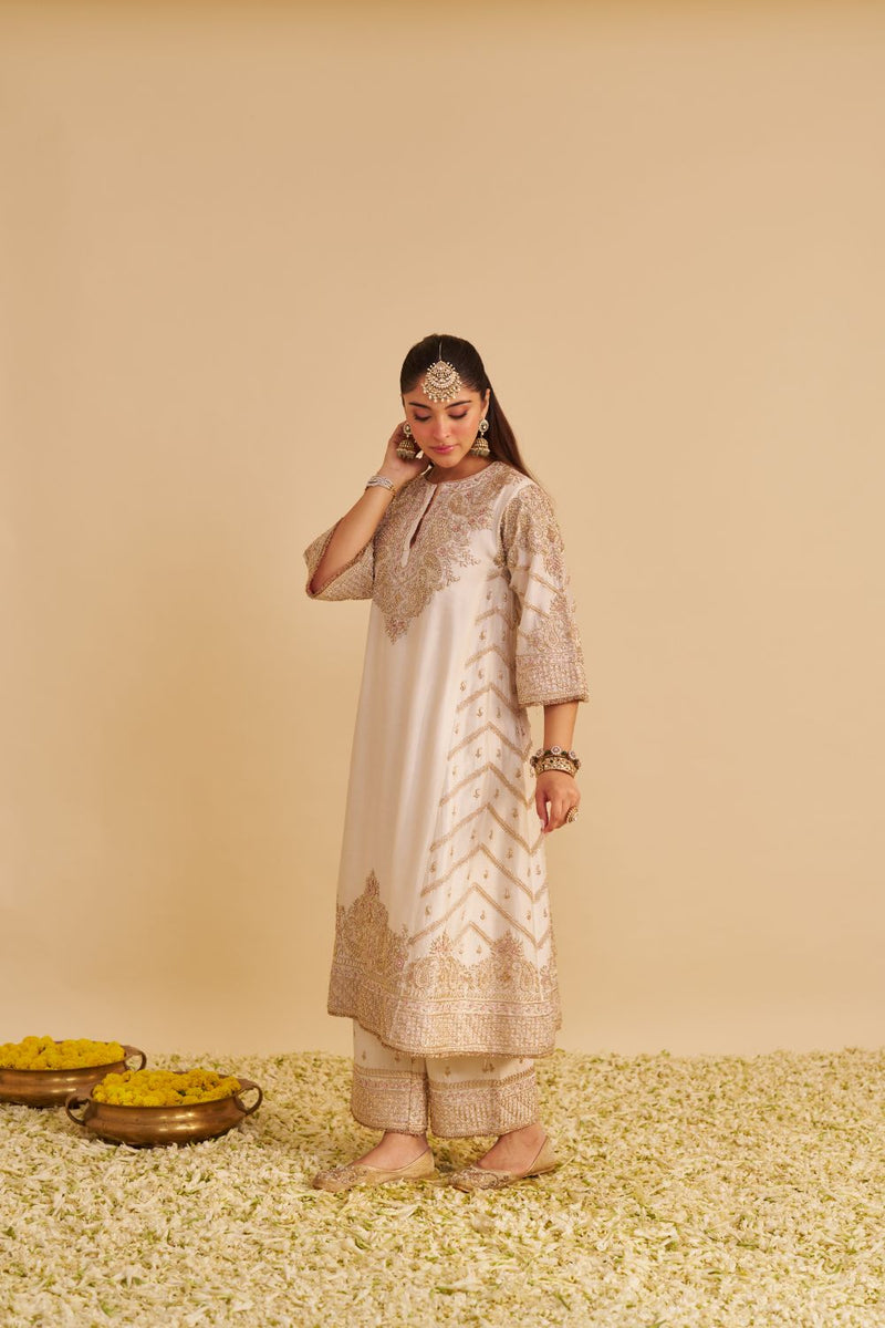 Aqsha - Dabka Zardozi Embroidered Rich Banarasi Daisy Ivory Long Chauga & Palazzo silk by SHEETAL BATRA in ivory color for women in Singapore