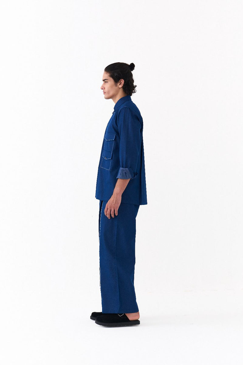 EMB. DETAIL BOTTOM-DENIM BLUE-DENIM BLUE by THREE Men in blue color for men in Singapore