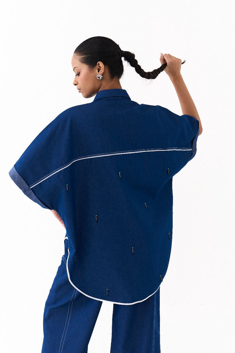 EMB. U-HEM SHIRT-DENIM BLUE by THREE in blue color for women in Singapore