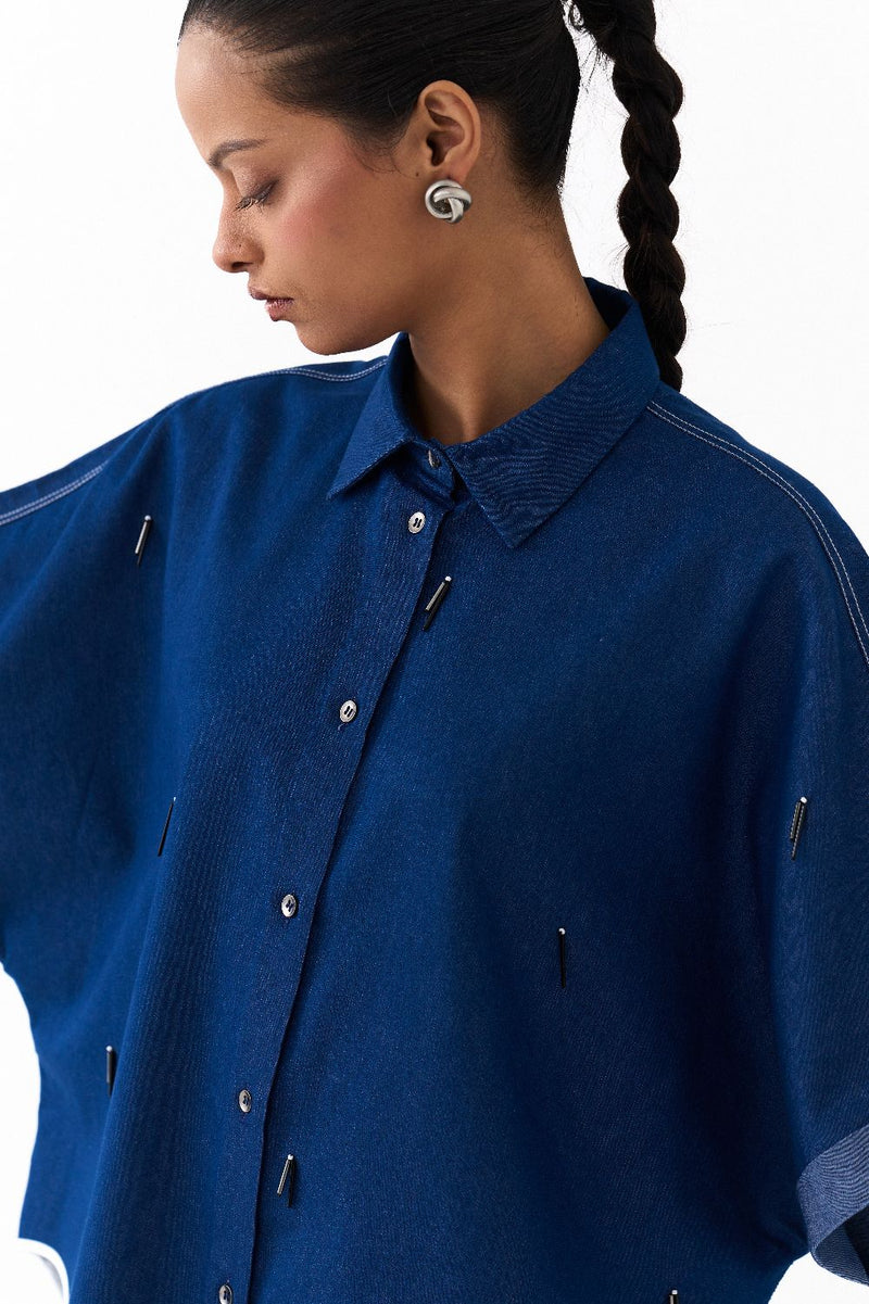 EMB. U-HEM SHIRT-DENIM BLUE by THREE in blue color for women in Singapore