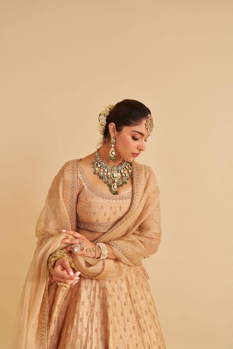 Aaliya - Dabka Zardozi Embroidered Raw Silk Gold Lehenga Set silk by SHEETAL BATRA in gold color for women in Singapore