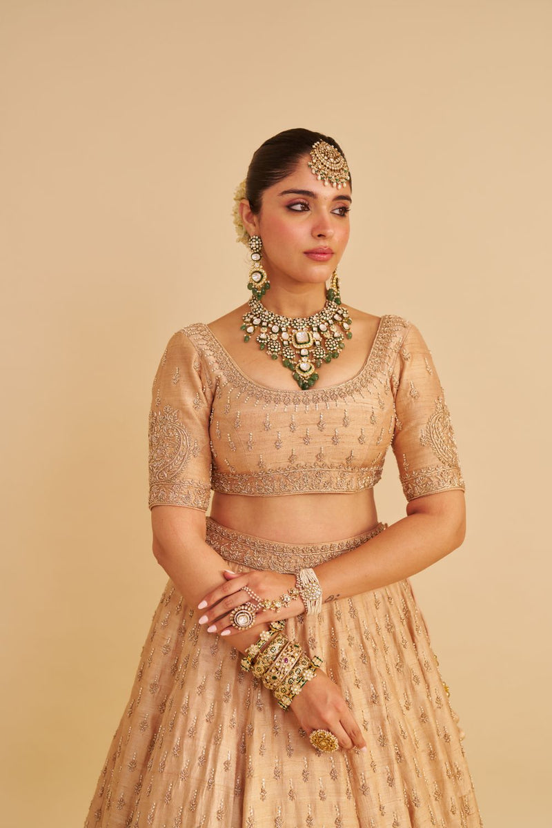 Aaliya - Dabka Zardozi Embroidered Raw Silk Gold Lehenga Set silk by SHEETAL BATRA in gold color for women in Singapore
