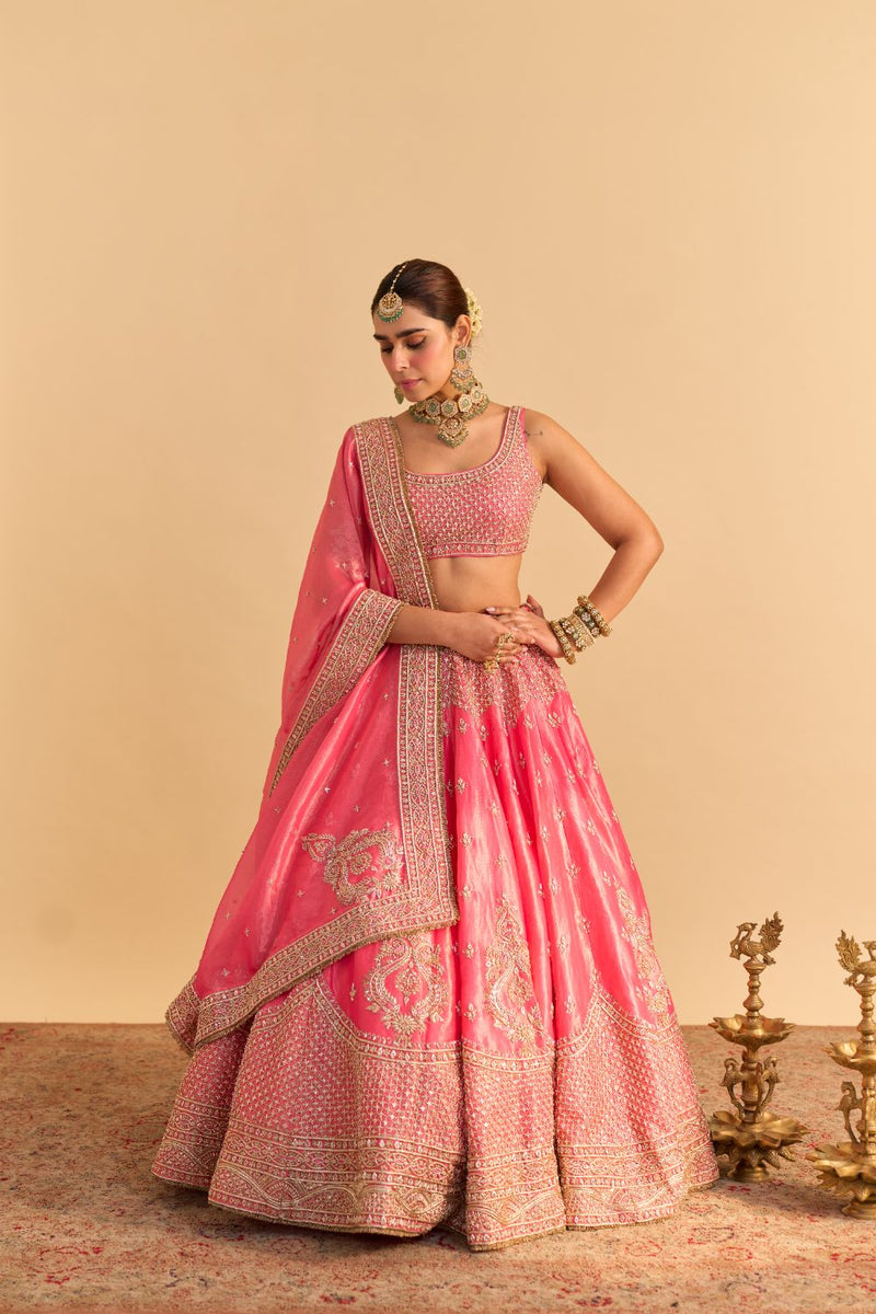 Aashina - Dabka Zardozi Embroidered Pure Tissue Carrot Pink Lehenga Set by SHEETAL BATRA in pink color for women in Singapore