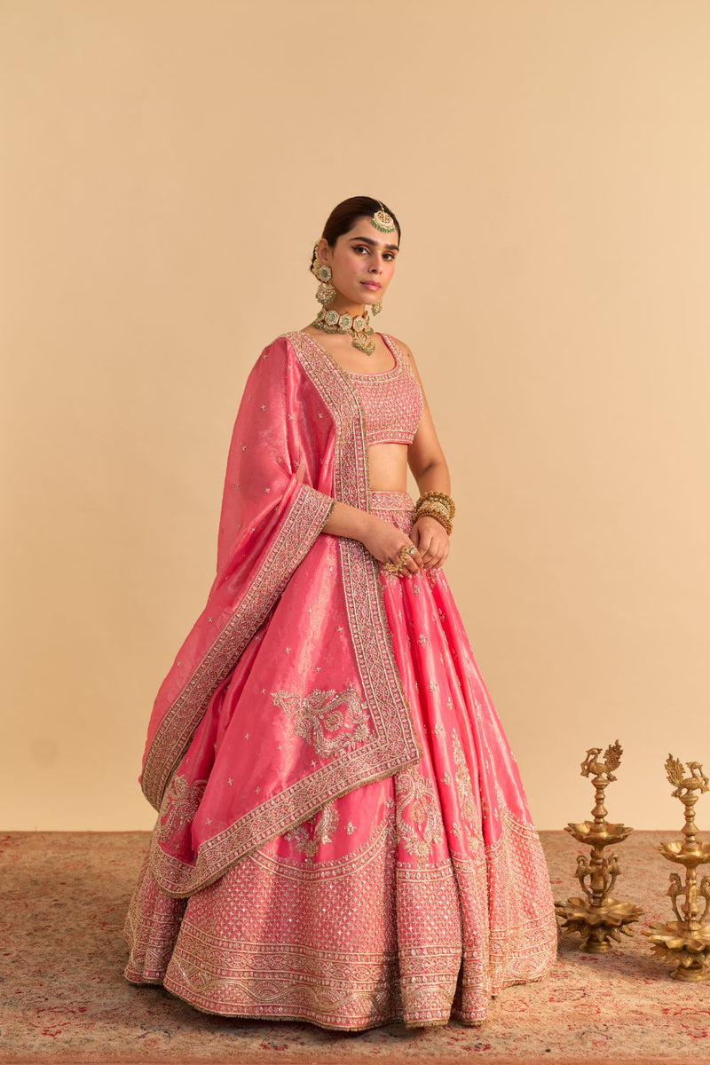 Aashina - Dabka Zardozi Embroidered Pure Tissue Carrot Pink Lehenga Set by SHEETAL BATRA in pink color for women in Singapore