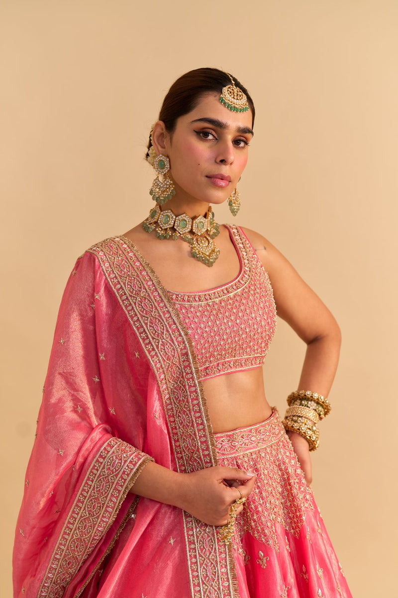 Aashina - Dabka Zardozi Embroidered Pure Tissue Carrot Pink Lehenga Set by SHEETAL BATRA in pink color for women in Singapore