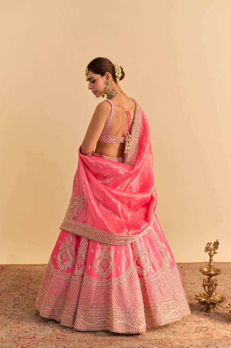 Aashina - Dabka Zardozi Embroidered Pure Tissue Carrot Pink Lehenga Set by SHEETAL BATRA in pink color for women in Singapore
