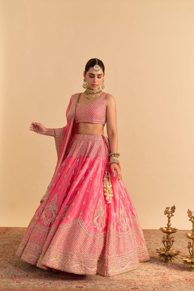 Aashina - Dabka Zardozi Embroidered Pure Tissue Carrot Pink Lehenga Set by SHEETAL BATRA in pink color for women in Singapore