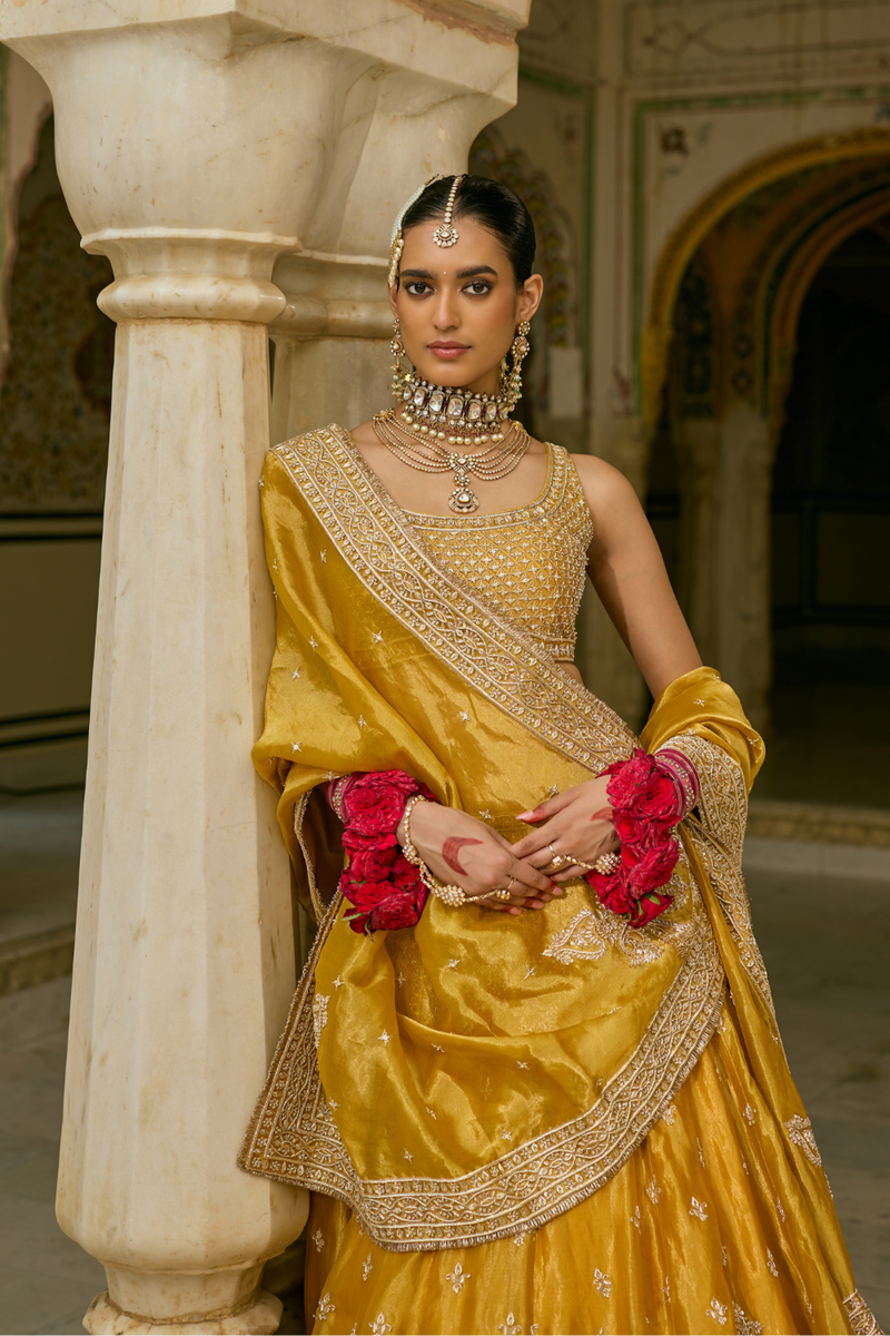 Aashina - Dabka Zardozi Embroidered Pure Tissue Mustard Lehenga Set silk by SHEETAL BATRA in gold color for women in Singapore