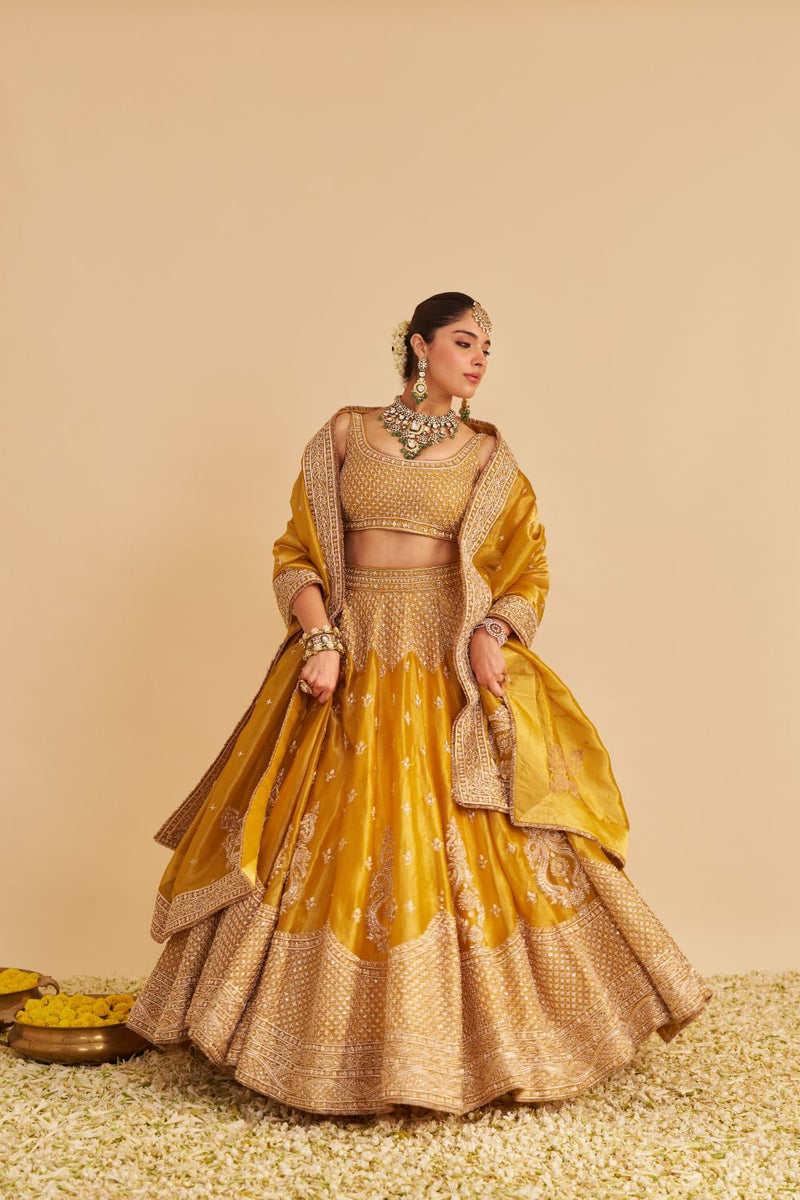 Aashina - Dabka Zardozi Embroidered Pure Tissue Mustard Lehenga Set silk by SHEETAL BATRA in gold color for women in Singapore