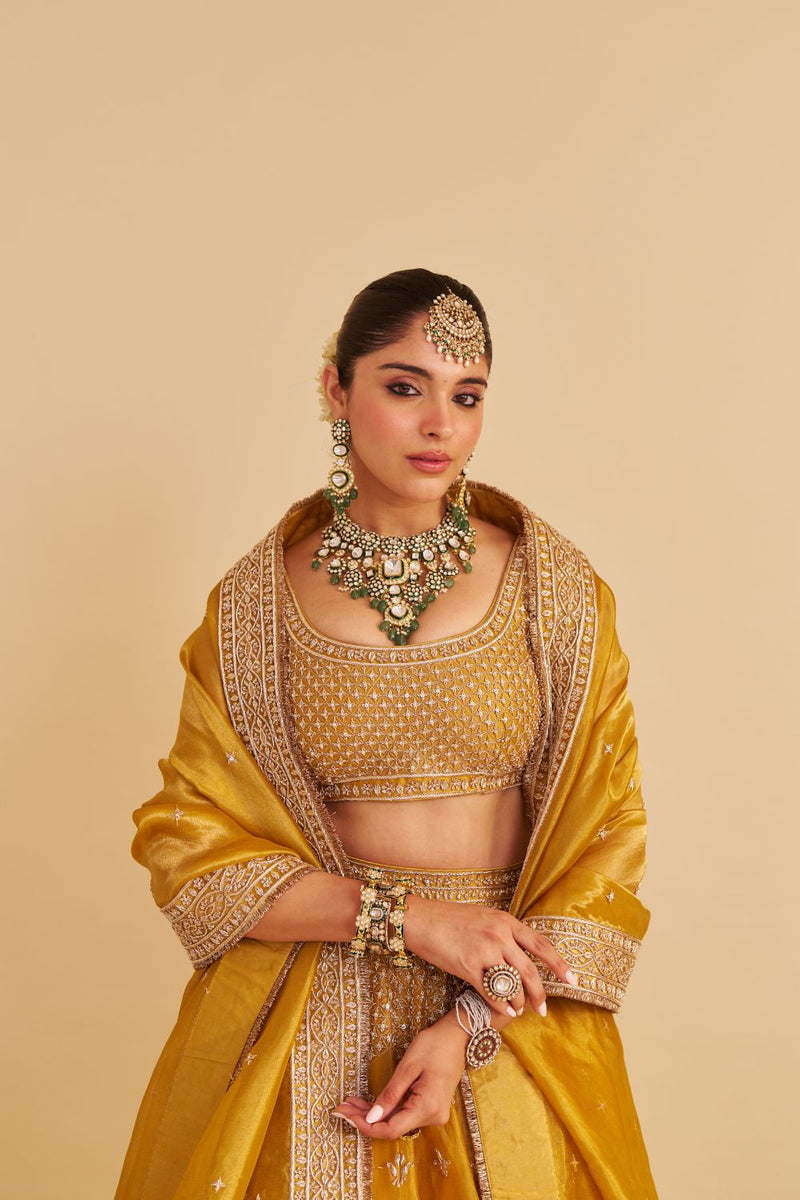 Aashina - Dabka Zardozi Embroidered Pure Tissue Mustard Lehenga Set silk by SHEETAL BATRA in gold color for women in Singapore