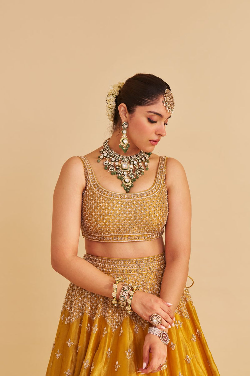 Aashina - Dabka Zardozi Embroidered Pure Tissue Mustard Lehenga Set silk by SHEETAL BATRA in gold color for women in Singapore