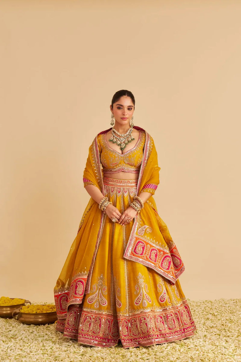 Amara - Hand Embroidered Raw Silk Mustard Bridal Lehenga Set silk by SHEETAL BATRA in mustard color for women in Singapore