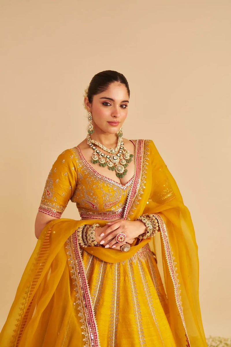 Amara - Hand Embroidered Raw Silk Mustard Bridal Lehenga Set silk by SHEETAL BATRA in mustard color for women in Singapore