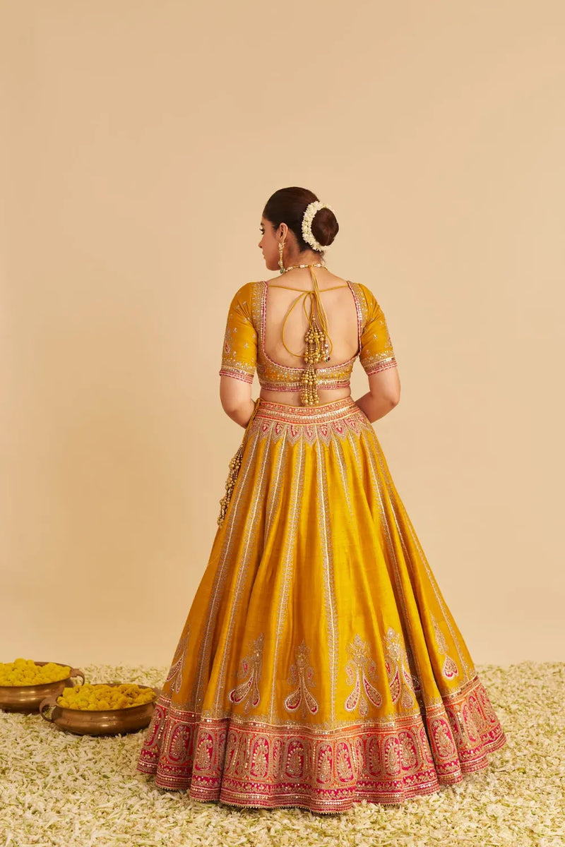 Amara - Hand Embroidered Raw Silk Mustard Bridal Lehenga Set silk by SHEETAL BATRA in mustard color for women in Singapore