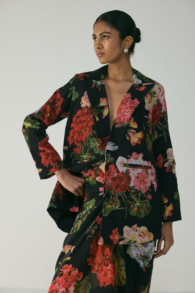 BLOODY MARY BLAZER & KNOTTED SKIRT SET by Yam in black color for women in Singapore