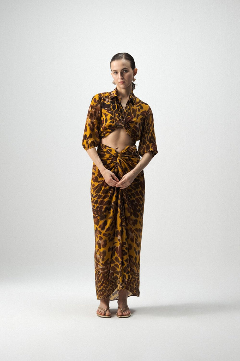 CHITARA TIE UP TOP AND KNOTTED SKIRT SET by Yam in yellow color for women in Singapore